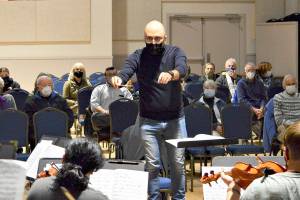 Conductor Tigran Arakelyan leads the Port Townsend Symphony Orchestra in rehearsal last month. The ensemble will give its winter concert this Saturday at the Chimacum High School auditorium. Diane Urbani de la Paz/Peninsula Daily News