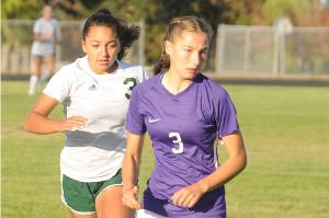 Sequim's Taryn Johnson (right), who scored 24 goals for the Wolves this season as a sophomore, made the All-Peninsula Girls Soccer team. (Michael Dashiell/Olympic Peninsula News Group)