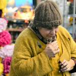 Artist Lisa Leporati checks the fragrance of her flower confetti, one of the items she'll offer during the Handwork Market, an artists' showcase at the Cotton Building in downtown Port Townsend on Saturday. Diane Urbani de la Paz/Peninsula Daily News