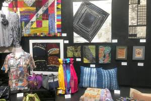 The Art As Gifts exhibit is in the Fiber Habit window at Tyler and Lawrence streets in Port Townsend.