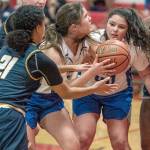 Steve Mullensky/for Peninsula Daily News
East Jefferson's Aurin Asbell, with ball, and Alyssa Vandenberg are blocked by Annie Wright's Jazmyn Stone 21 and Leah Kearns, 22, and Rae Wartell as she goes for the basket during a game Thursday at Port Townsend High School.