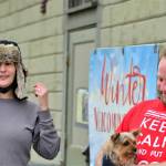 Lisa Anderson and Ben Casserd, along with Half Pint, their terrier mix, are the staff monitors at the Winter Welcoming Center. The center offers warmth, coffee, snacks, wi-fi and electricity for charging devices in the Pope Marine Building at Water and Madison streets in Port Townsend. (Diane Urbani de la Paz/Peninsula Daily News)