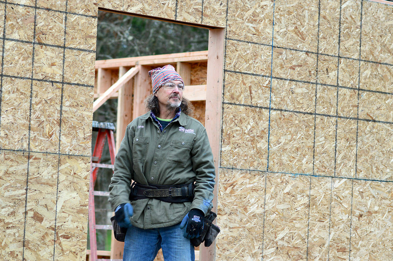 Habitat for Humanity job site supervisor Dave Weld of Sequim drives into Port Townsend to work with a crew of volunteers on a two-bedroom house he says will be filled with natural light. Its one of several Habitat homes to be finished in 2022. (Diane Urbani de la Paz/Peninsula Daily News)