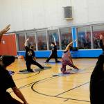 Kitty Sokkappa leads a yoga class at the YMCA of Sequim. Its one of the biggest at the facility, staff say. Starting Jan. 1, club members and participants ages 12 and older in all North Olympic Peninsula YMCAs must provide proof of COVID-19 vaccine or a negative test before participating in events. (Matthew Nash/Olympic Peninsula News Group)