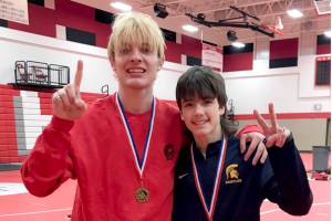 Forks' Jake Weakley, left, and Matthew Montes have won their weight divisions at three straight tournaments through December.