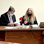 Dennis Marvin Bauer, left, speaks with his attorney, Karen Unger, before testimony in his triple-murder trial Monday at the Clallam County Courthouse. (Rob Ollikainen/For Peninsula Daily News)