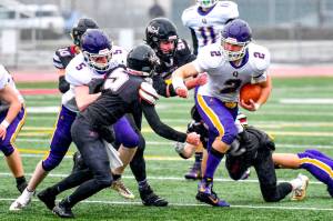 Bishop Budnek (2) runs the ball in the state 1B championship game against Almira-Coulee-Hartline. (Jim Wilkerson/for Peninsula Daily News)