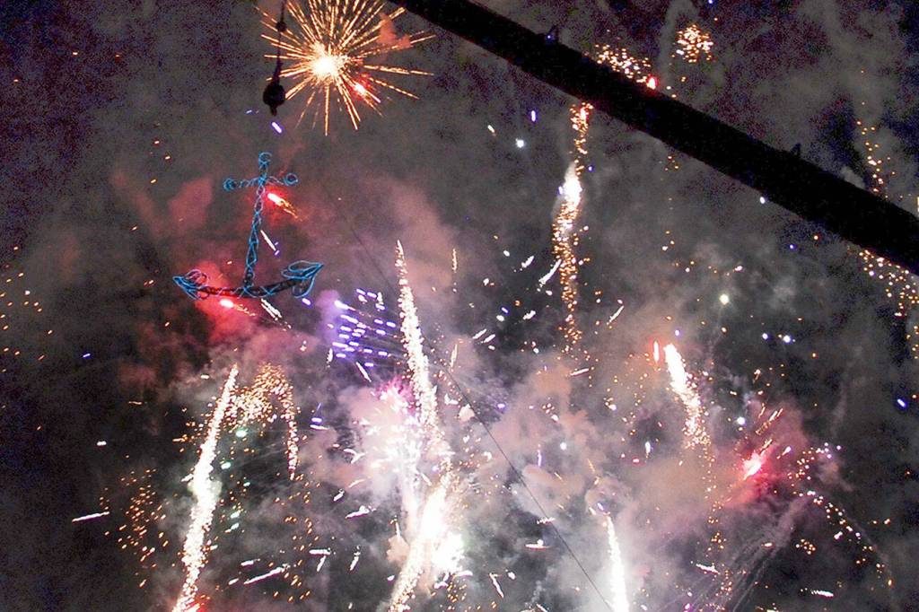 Fireworks detonate as the anchor is raised during one of Port Townsend’s First Night celebrations in this file photo.(Peninsula Daily News)