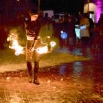 Alex Eisenberg of Port Townsend did some fire dancing during the First Night festivities Friday at downtown's Pope Marine Park. He's part of an ensemble that includes Ashley Kehl of Port Townsend and Cristy Christensen of Bellingham.  Diane Urbani de la Paz/Peninsula Daily News