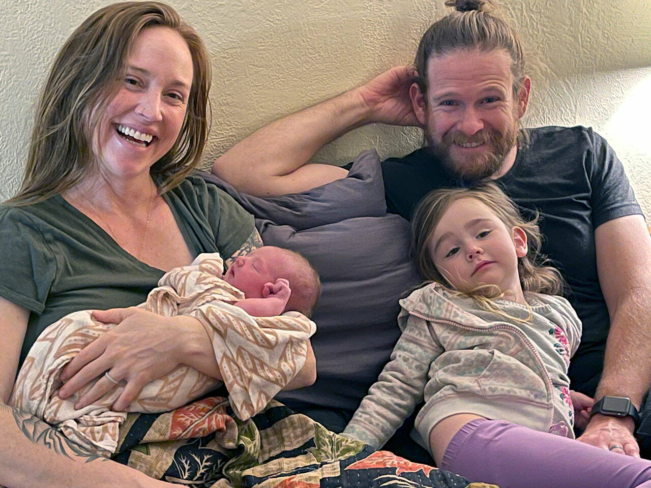 Indie Bo Bruner was born at home to Laura and Rusty Bruner of Port Angeles at 2:44 a.m. New Years Day. She is seen here soon after the birth with her older sister, Evie Wilder Bruner, by her side. (Mallorie Kirsch, LM CPM)