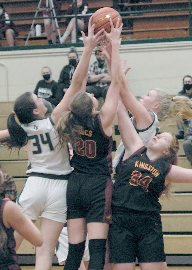 Keith Thorpe/Peninsula Daily News
Port Angeles' Lexie Smith, left, and Paige Mason, upper right, battle for a rebound with Kingston's Ellee Brockman and Kian Mills, right, in the second quarter on Thursday in Port Angeles.