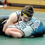 Kaleb Blanton of Forks, top, takes on River Ridges Collin Andrews in the 152-pound class on Saturday in Port Angeles. (Keith Thorpe/Peninsula Daily News)