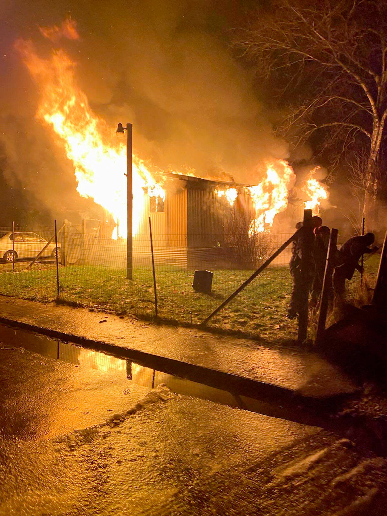 A mobile home off Calawah Way in Forks was destroyed in a fire that started behind a refrigerator. (Forks Fire Department)