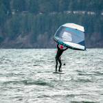 A wing-foiler hones his skills on windy Port Townsend Bay. The forecast calls for more seasonal temperatures this week with highs in the mid- to upper 40s and lows in the high 30s. (Steve Mullensky/for Peninsula Daily News)