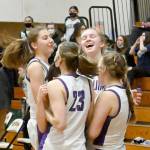 SequimCelebrates
Michael Dashiell/Olympic Peninsula News Group
Sequim players celebrate after snapping Port Angeles' 12-game rivalry winning streak and 31-game Olympic League winning streak in a 60-55 win Tuesday night.