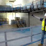 Project Director Chris Fidler stands on the stage of the Field Arts & Events Halls performance venue in March 2021. (Keith Thorpe/Peninsula Daily News file)