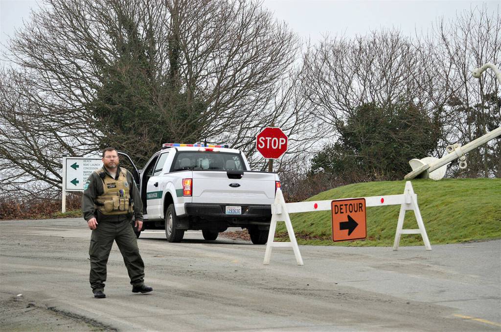 Fort Worden State Park Ranger John Whittet redirected people away from the forts beach Saturday morning. Campers on the waterfront campground were also invited to move to a campsite on higher ground. (Diane Urbani de la Paz/Peninsula Daily News)