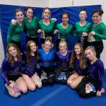 The Port Angeles/Sequim/Crescent gymnastics team won a dual with Kingston this weekend. From left, back row, are Faith Caar, Maddie Adams, Kathryn Jones, Yau Fu, Jessamyn Schindler and Mei-Ying Harper-Smith. From left, front row, are Ellie Turner, Danica Pierson, Aubrie Scott, Alex Schmadeke, Amara Brown and Susannah Sharp. (Courtesy photo)