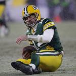 Green Bay Packers Aaron Rodgers reacts after being sacked by San Francisco 49ers Arik Armstead during the second half of an NFC divisional playoff NFL football game Saturday, Jan. 22, 2022, in Green Bay, Wis. (AP Photo/Aaron Gash)