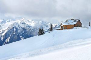 Snow-covered mountains surround the Hurricane Ridge Visitor Center in 2009. (Peninsula Daily News)
