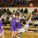 Port Angeles' Xander Maestas actually made this shot Saturday against Sequim and picked up a foul for a 3-point play Saturday. Also in on the play are, from left, Sequim's Isaiah Moore, Zach Thompson, Cole Smithson and Tyler Mooney. (Dave Logan/for Peninsula Daily News)