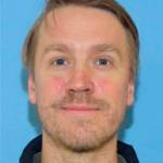 This undated photo released by the Richland, Wash., Police Department shows suspect Aaron Christopher Kelly. Police say the 39-year-old was detained late Monday night, Feb. 7, 2022, on I-90 near Spokane just before midnight. Police in the city of Richland where the shooting happened in a Fred Meyer store, say Kelly will be booked into the Benton County Jail on charges of first-degree murder and first-degree attempted murder. The shooting left one man dead and the other man hospitalized in critical condition. (Richland WA Police Department via AP)