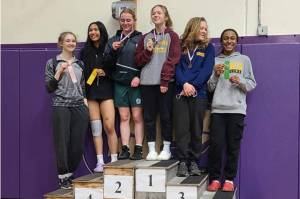 Photo courtesy of Rob Gale
Members of the Port Angeles girls wrestling team celebrate finishing sixth out of 30 teams at subregionals held Saturday at Sequim High School. The girls finished with 94 points and were just seven points out of third. From left, are Ada Oberwarth, Charlize Pasco, Kennedy Bruch, Shelby Moore,  Alexandra Morrison and Heavenly King. Bruch finished second in her 130-pound weight division, making it to the championship round.