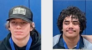 Conner Demorest, left, and Sloan Tumaua, Forks wrestling