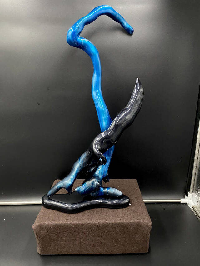 Blue Wonder is one of the driftwood art pieces by John Bertholl that will be on display at the Blue Whole Gallery.