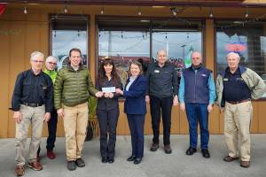 Pictured, from left to right, are Bob and Kelly Macaulay, Jason Bausher, Mary Budke, Anna Richmond, Ren Garypie, Don Sorensen and Jim Jones.