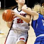 Neah Bays Amber Swan drives to the basket Thursday against Wilbur-Creston-Keller in the 1B state quarterfinals. Swan scored 21 points in Neah Bays 59-47 win. (Roger Harnack/Cheney Free Press)