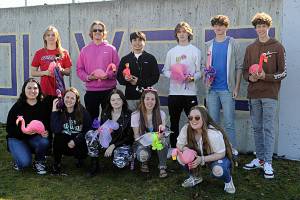 Matthew Nash/Olympic Peninsula News Group

The fundraiser for Sequim High’s Class of 2022 graduation party placing flamingos on lawns started last Sunday. Pictured on the first night, are from top left, Tyler Lawson, Harrison Bell, Kristian Mingoy, Kaden Sleeper, Duke Anderson, Adrian Brown; bottom left, Alisa Bibaj, Desara Bibaj (sophomore), Madison McKeown, Jordan Hegtvedt, and Abigail Carlson.