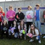 The fundraiser for Sequim Highs Class of 2022 graduation party placing flamingos on lawns started last Sunday. Pictured on the first night are, from top left, Tyler Lawson, Harrison Bell, Kristian Mingoy, Kaden Sleeper, Duke Anderson, Adrian Brown; bottom left, Alisa Bibaj, Desara Bibaj (sophomore), Madison McKeown, Jordan Hegtvedt and Abigail Carlson. (Matthew Nash/Olympic Peninsula News Group)