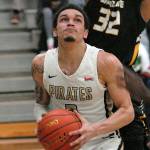 Keith Thorpe/Peninsula Daily News
Peninsula's Jaylin Reed, front, looks for the hoops as Shoreline's Morgan Brown defends the lane on Wednesday at Peninsula College in Port Angeles.