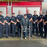 Matthew Nash/Olympic Peninsula News Group 

Clallam County Fire District 3 firefighters meet with Gregg Vella weeks after rescuing him from a house fire. Pictured from, left, are firefighter/EMT Jaisal White; firefighter/paramedic Len Horst; Capt. Stef Anderson; firefighter/paramedic Chase Laubach; Capt. Kjel Skov; Vella; firefighter/paramedic Mark Mullvain; Capt. Joel McKeen; firefighter/EMT Jared Romberg; firefighter/paramedic Casey Sires; firefighter/paramedic Jack Hueter.