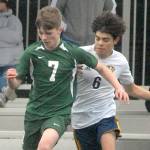 Keith Thorpe/Peninsula Daily News
Port Angeles' Caleb Gagnon, left, fends off Forks' Arturo Dominguez on Saturday in Port Angeles.