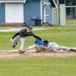 Steve Mullensky/for Peninsula Daily News
East Jefferson Rival Nathan Nisbet tags safe at third before the ball reached Quilcene’s third baseman Aiden Kate during a non-league game played in Chimacum on Monday. East Jefferson won the game 11-4.