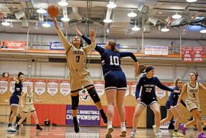 Jay Cline/Peninsula College Athletics
Peninsula Ituau Tuisaula (13) battles inside against Portland's Iris Cubit (10) in the Pirates' 64-59 win the NWAC Elite Eight on Sunday night. Also in on the play are Millie Long (3) and Keeli-Jade Smith (0).