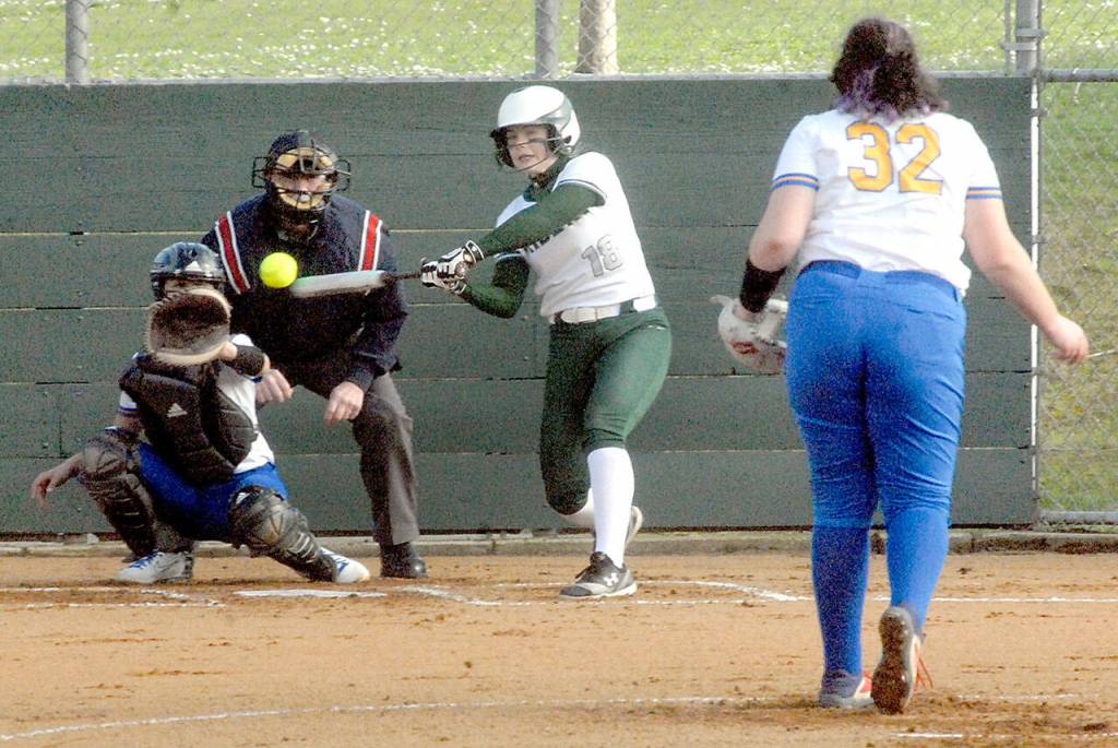 Port Angeles Lily Halberg bats in the first inning as Bremerton catcher Attianna Cabato waits for the delivery from pitcher Brooke Baker on Tuesday in Port Angeles. (Keith Thorpe/Peninsula Daily News)