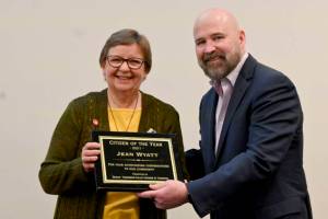 Michael Dashiell/Olympic Peninsula News Group
Longtime Sequim Irrigation Festival volunteer Jean Wyatt receives the 2021 Sequim Citizen of the Year honor from Terry Ward, publisher of the Peninsula Daily News and Sequim Gazette, on Tuesday at 7 Cedars Resort.