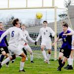 Michael Dashiell/Olympic Peninsula News Group
Sequim's Ethan Knight, right, is surrounded by Bainbridge defenders near the Spartans' goal box during the Wolves' 3-0 loss on Tuesday.