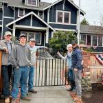 The Peninsula College welding program has fabricated a new gate for the Captain Joseph House in Port Angeles. Pictured, from left to right, are Peninsula College students Blake Parker, James Hancock, welding instructor Eoin Doherty, Betsy Reed Schultz, and welding instructor Kelly Flanagan.