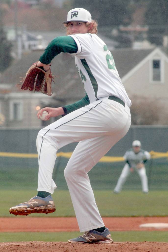 Port Angeles pitcher John Vaara throws in the first inning against Peninsula on Friday in Port Angeles. (Keith Thorpe/Peninsula Daily News)