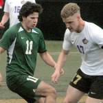 Keith Thorpe/Peninsula Daily News
Port Angeles' Xander Maestas, left, and Sequim's Aidan Henninger face off for ball control as Sequim's Harrison Bell looks on during Tuesday's match at Peninsula College in Port Angeles.