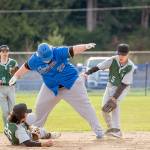Steve Mullensky/for Peninsula Daily News

East Jefferson Rival Chris Fair maintains his balance on 2nd base so as to not get tagged out by Charles Wright’s Brandon Bennett, who has the ball in his hand, during a game in Chimacum on Wednesday. Charles Wright’s Cory Mallrie, 10, and Cole Caalim, %, are backing up the play.