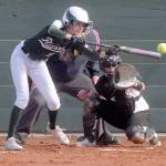 Port Angeles Emi Halberg bunts in the first inning against Kingston on Thursday at Dry Creek School in Port Angeles. Keith Thorpe/Peninsula Daily News