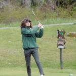 Edun Bailey of Port Angeles tees off on the first hole against Sequim on Friday at Peninsula Golf Club in Port Angeles. (Keith Thorpe/Peninsula Daily News)