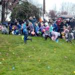 Children burst from the starting area in search if treat-filled plastic eggs during Saturdays 44th annual KONP Easter Egg Hunt at the Clallam County Fairgrounds in Port Angeles. Hundreds of children and their parents took part in the event, which also featured a visit from the Easter Bunny and a drawing for prizes. (Keith Thorpe/Peninsula Daily News)