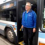 Clallam Transit driver Joe Sutton steps off his bus without a mask after arriving at The Gateway transit center in downtown Port Angeles on Tuesday. (Keith Thorpe/Peninsula Daily News)