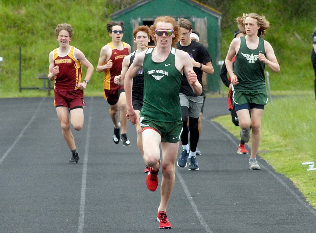 Keith Thorpe/Peninsula Daily News Port Angeles Jack Gladfelter pulls away from the pack to win the boys 1600m race on Thursday at Port Angeles High School.